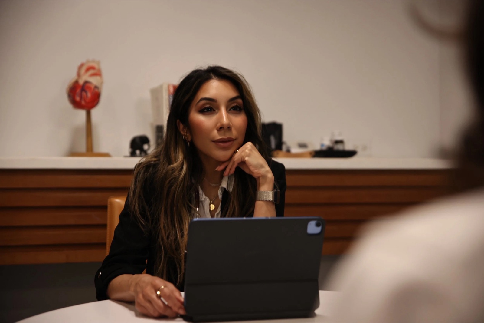 Dr. Rue Laka at her desk